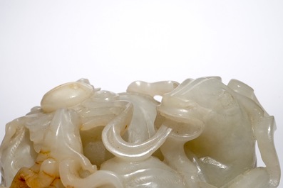 A Chinese white jade carving of a "Three rams" group, 19/20th C.