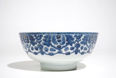 A Chinese blue and white bowl, Qianlong, and an iron red dish, 19th C.