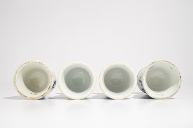 Two pairs of Chinese blue and white candlesticks with dragons, 19/20th C.