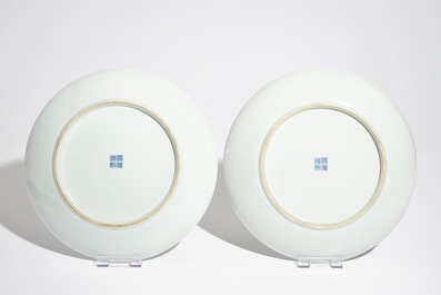 A pair of Chinese famille rose vases and covers, 19th C., and a pair of blue and white dishes, 20th C.