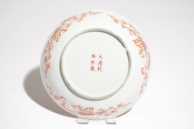 A Chinese blue and white bowl, a qianjiang cai brush pot and an iron red plate, 19/20th C.