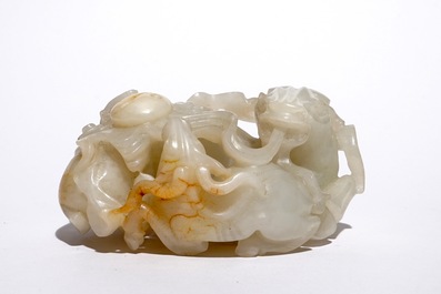 A Chinese white jade carving of a "Three rams" group, 19/20th C.