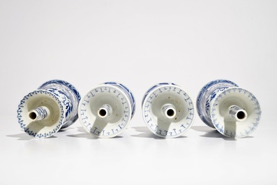 Two pairs of Chinese blue and white candlesticks with dragons, 19/20th C.