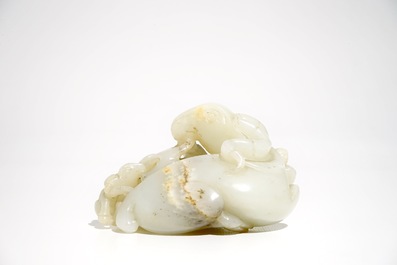 A Chinese white jade carving of a "Three rams" group, 19/20th C.