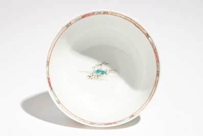 A Chinese famille rose cup and saucer with landscape design, Yongzheng/Qianlong
