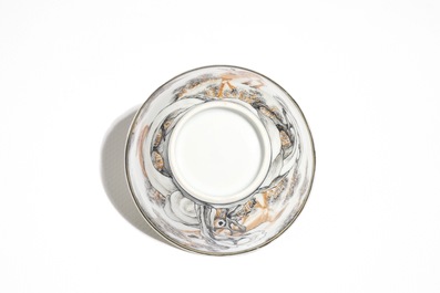A Chinese anhua decorated cup and saucer with polychrome deer design, Yongzheng