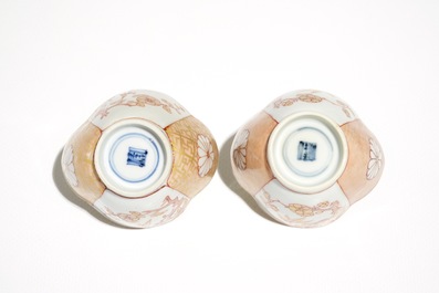 A pair of Chinese milk and blood quatrefoil cups and saucers, Kangxi
