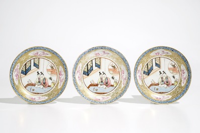 Three Chinese famille rose and gilt cups and saucers, Yongzheng/Qianlong