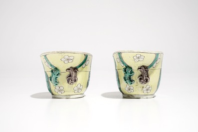 A pair of Chinese verte biscuit libation cups, 18/19th C.