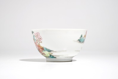 A Chinese famille rose cup and saucer with landscape design, Yongzheng/Qianlong