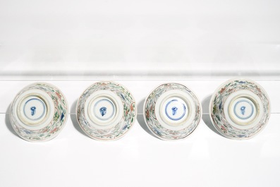 Four Chinese famille verte cups and saucers with pheasants and flowers, Kangxi