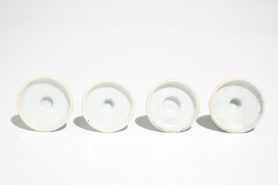 Four small Chinese blue and white floral candlesticks, Kangxi