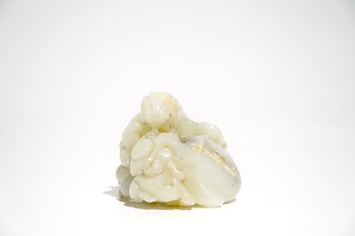A Chinese white jade carving of a "Three rams" group, 19/20th C.