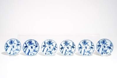 Six Chinese blue and white cups and saucers with warriors on horseback, Kangxi