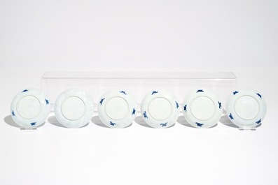 Six Chinese blue and white cups and saucers with warriors on horseback, Kangxi