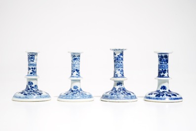 Four small Chinese blue and white floral candlesticks, Kangxi