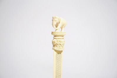 Two carved ivory figures and a reticulated knife, India and/or Nepal, 19/20th C.