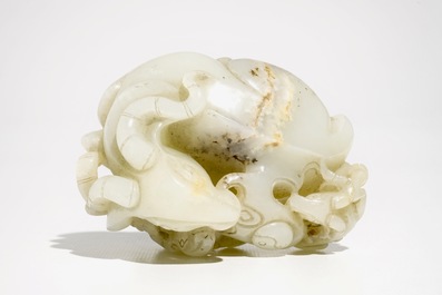 A Chinese white jade carving of a "Three rams" group, 19/20th C.