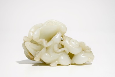 A Chinese white jade carving of a "Three rams" group, 19/20th C.