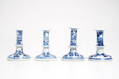 Four small Chinese blue and white floral candlesticks, Kangxi