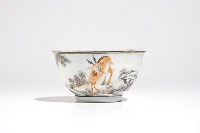 A Chinese anhua decorated cup and saucer with polychrome deer design, Yongzheng