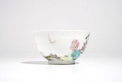 A Chinese famille rose cup and saucer with landscape design, Yongzheng/Qianlong
