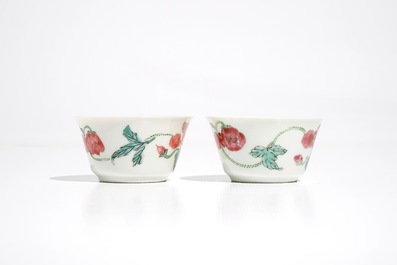 Two Chinese famille rose cups and three saucers with floral design, Yongzheng/Qianlong