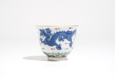 A Chinese famille rose cup and stand with dragon design, Qianlong mark, 19/20th C.