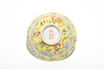 A Chinese famille rose yellow-ground bowl with bats and peaches, Guangxu mark, 19/20th C.