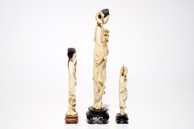 Three Chinese ivory figures on wooden bases, 19/20th C.