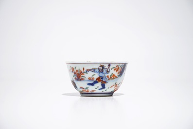 A Chinese Dutch-decorated Amsterdams bont cup and saucer with a tiger, Kangxi/Qianlong