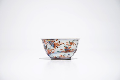 A Chinese Dutch-decorated Amsterdams bont cup and saucer with a tiger, Kangxi/Qianlong