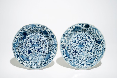 Two Chinese blue and white vases and a pair of plates, Kangxi