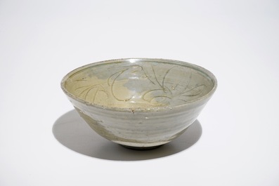 A Chinese incised celadon shipwreck bowl, Song