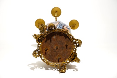 A large brass and gilt bronze-mounted Japanese Imari vase and cover candelabra, 19th C.
