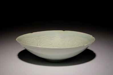A Chinese incised qingbai foliate bowl with underglaze floral design, Song