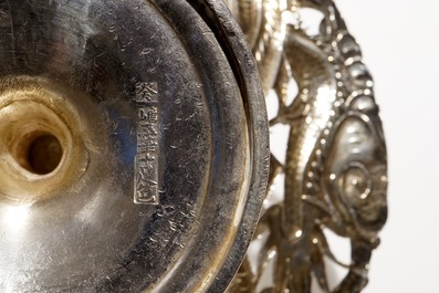 A Chinese silver tea caddy and an openworked dragon tazza, 19/20th C.