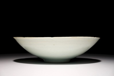 A Chinese incised qingbai foliate bowl with underglaze floral design, Song