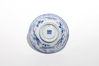 Eight Chinese blue and white cups and eleven saucers with fish, Kangxi
