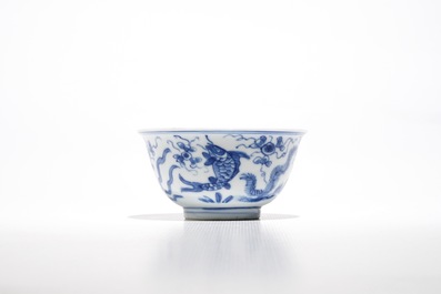 Eight Chinese blue and white cups and eleven saucers with fish, Kangxi