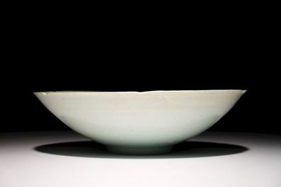 A Chinese incised qingbai foliate bowl with underglaze floral design, Song