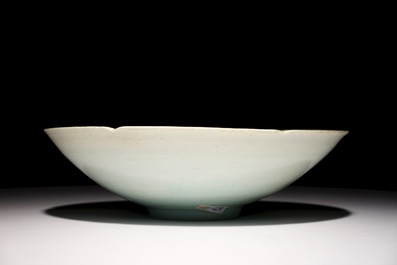 A Chinese incised qingbai foliate bowl with underglaze floral design, Song