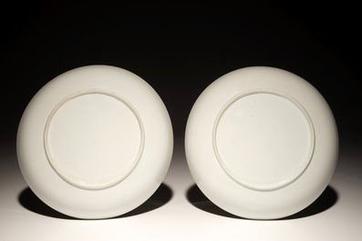 A pair of Chinese Pronk studio eggshell plates with parrots on a perch, Yongzheng/Qianlong