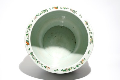 A Chinese famille verte fish bowl with figural design, 19th C.
