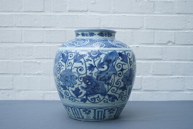 A Chinese blue and white vase with Buddhist lions and peonies, Ming, Wanli