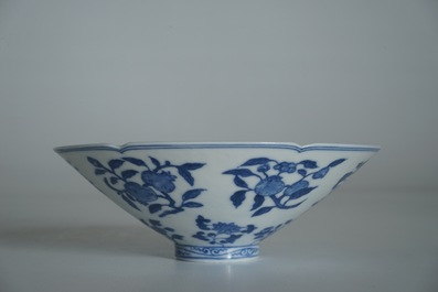A Chinese blue and white bowl with flowers and fruits, 19th C.