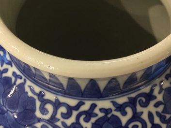 A Chinese blue and white peony scroll vase, 19th C.