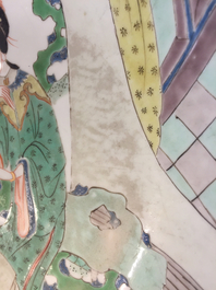 A Chinese famille verte plate with a lady in the garden, Kangxi mark and period