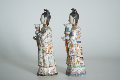 Two large Chinese famille rose candle holders modelled as court ladies, Qianlong