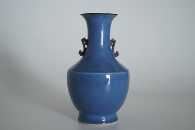 A Chinese blue ground-vase with rabbits and butterflies, 19th C.